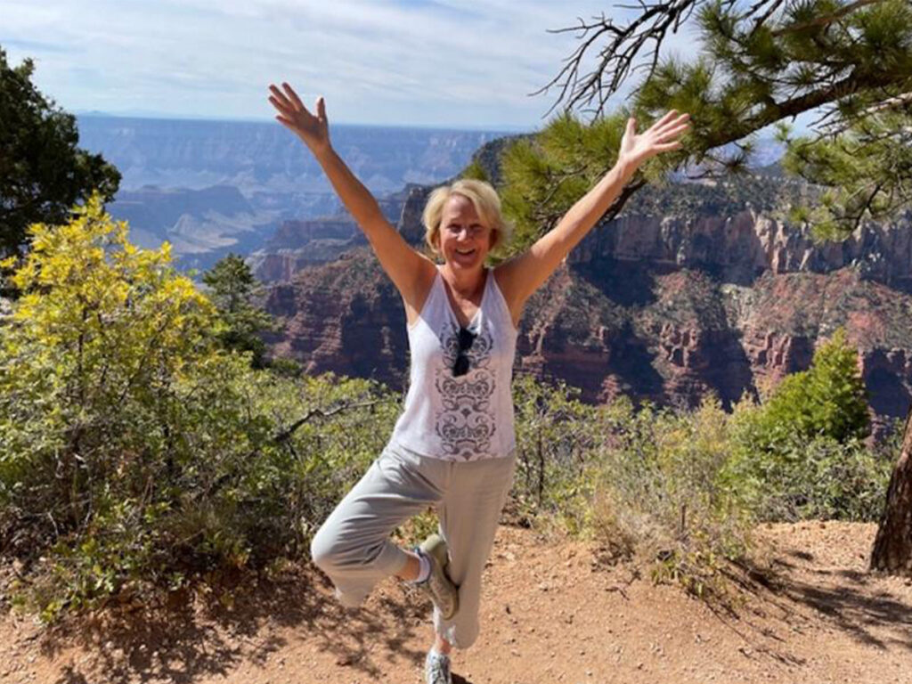 Lisa Graff - Doing a tree pose yoga exercise on the north rim of the Grand Canyon feels great!