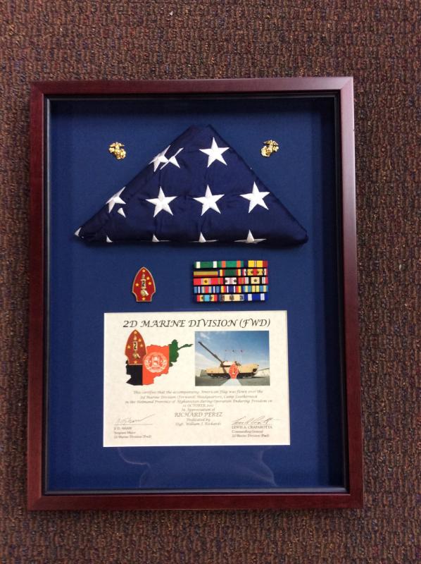 Carol Boyd-Heron of The Peninsula Gallery in Lewes created a military career box to hold the mementoes of one customer.